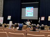 Donna Orender speaks to students at Pedro Menendez High School