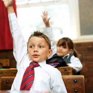 student raising hand