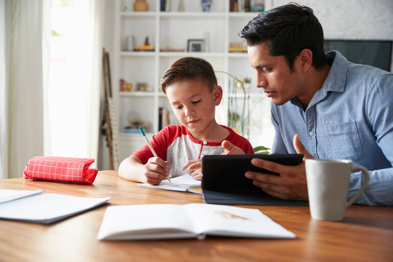 Parent working with child on homework