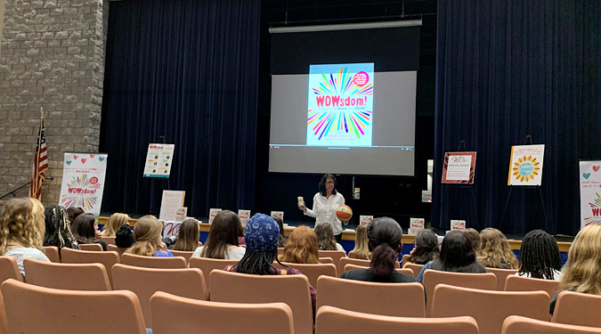 Donna Orender speaks to students at Pedro Menendez High School