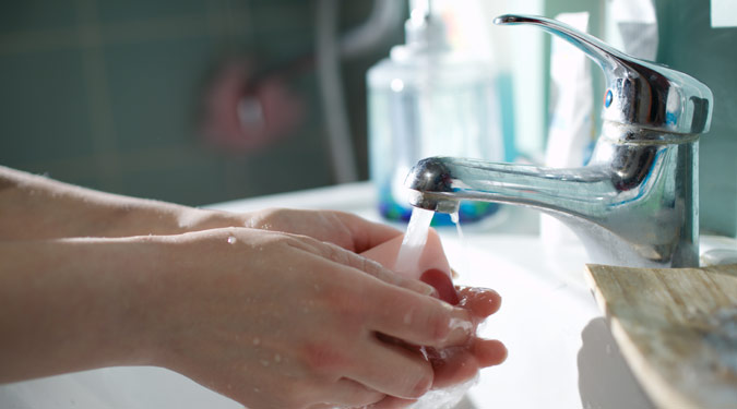 Person washing their hands