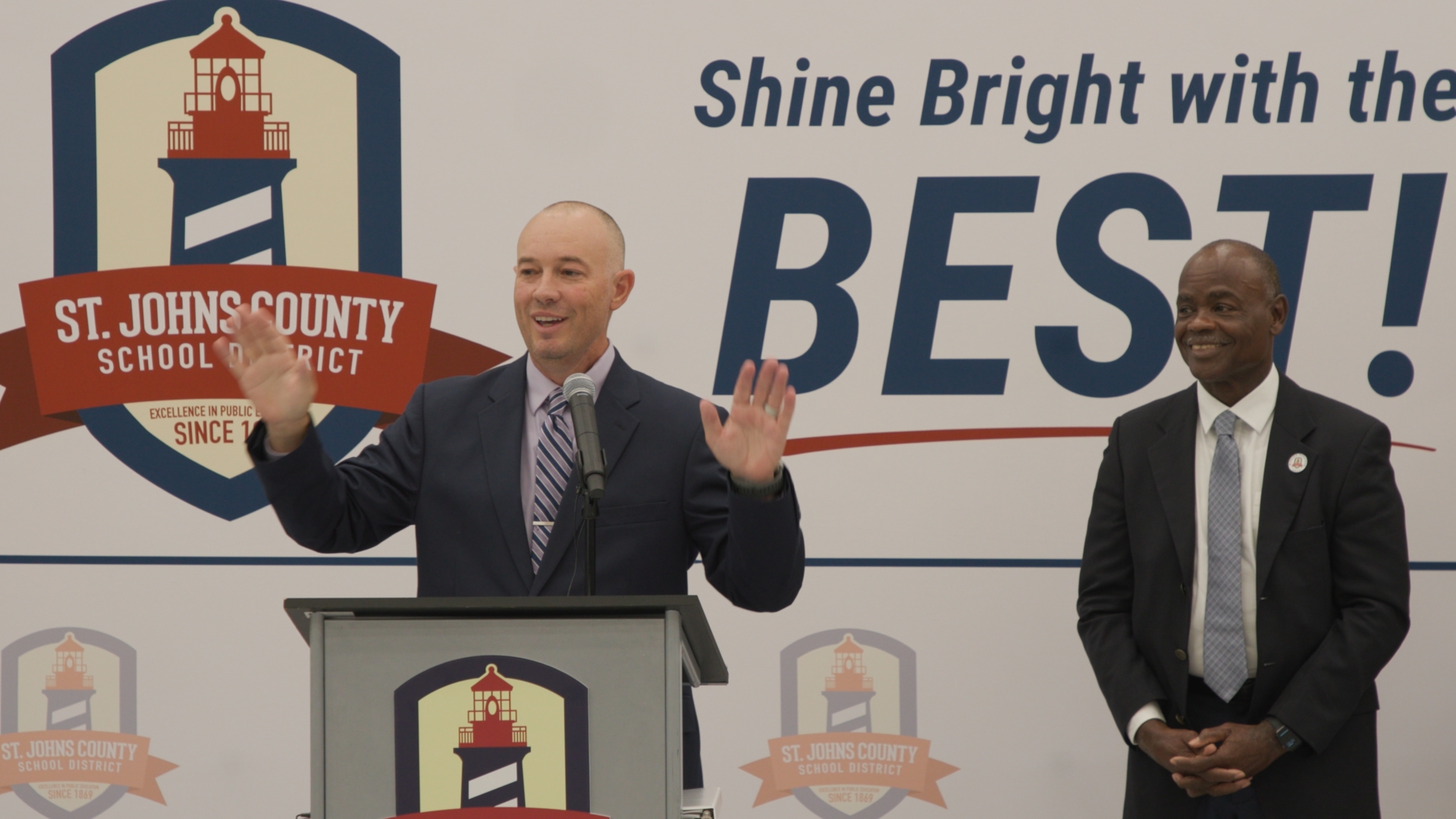 Magnolia Oaks Academy Principal Donny Hoessler speaks at an event celebrating the opening of the new school.